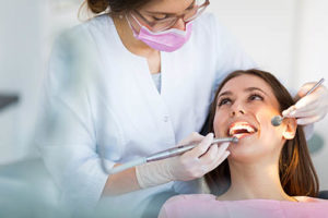 woman receiving dental bonding pasadena tx