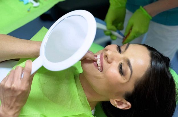 what is cosmetic dentistry woman seeing the results of cosmetic dentistry