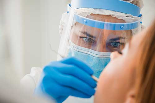 What-Are-Emergency-Dental-Services a woman