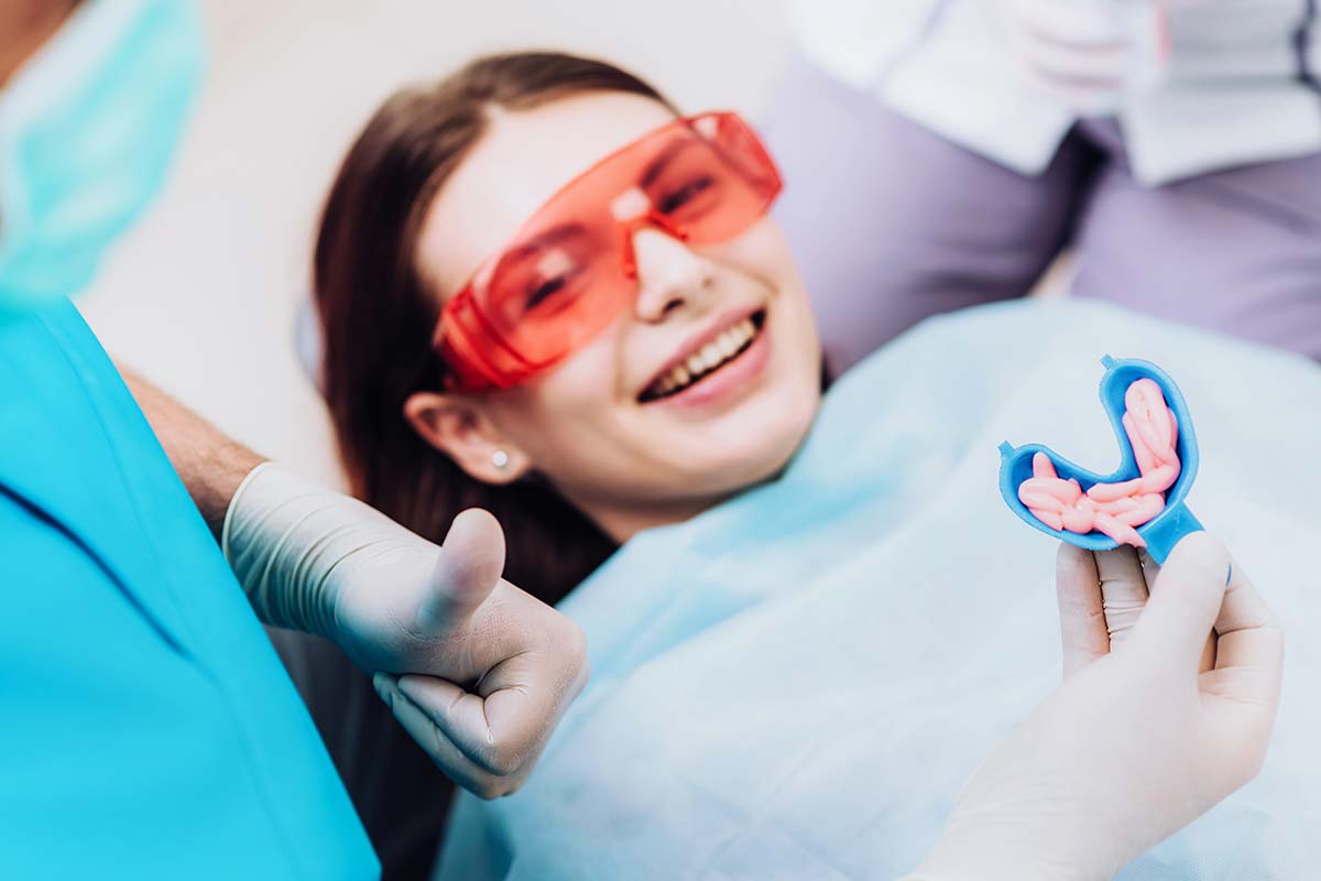 a woman getting benefits of fluoride