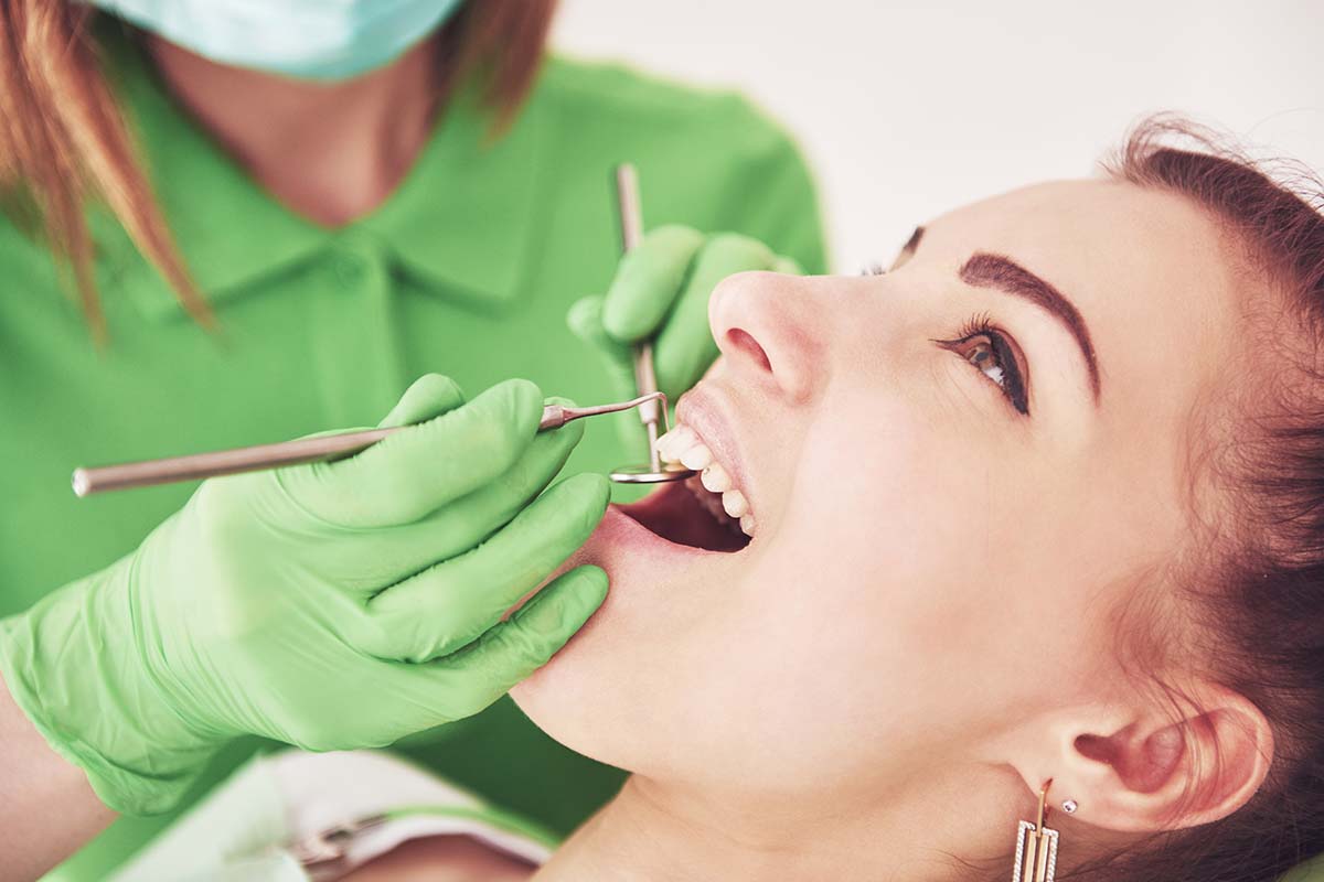 woman gets oral surgery