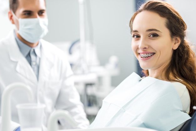 5 Signs You Need Dental Braces Again woman needed braces again